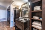 master suite vanity, tile floors, bath towels provided